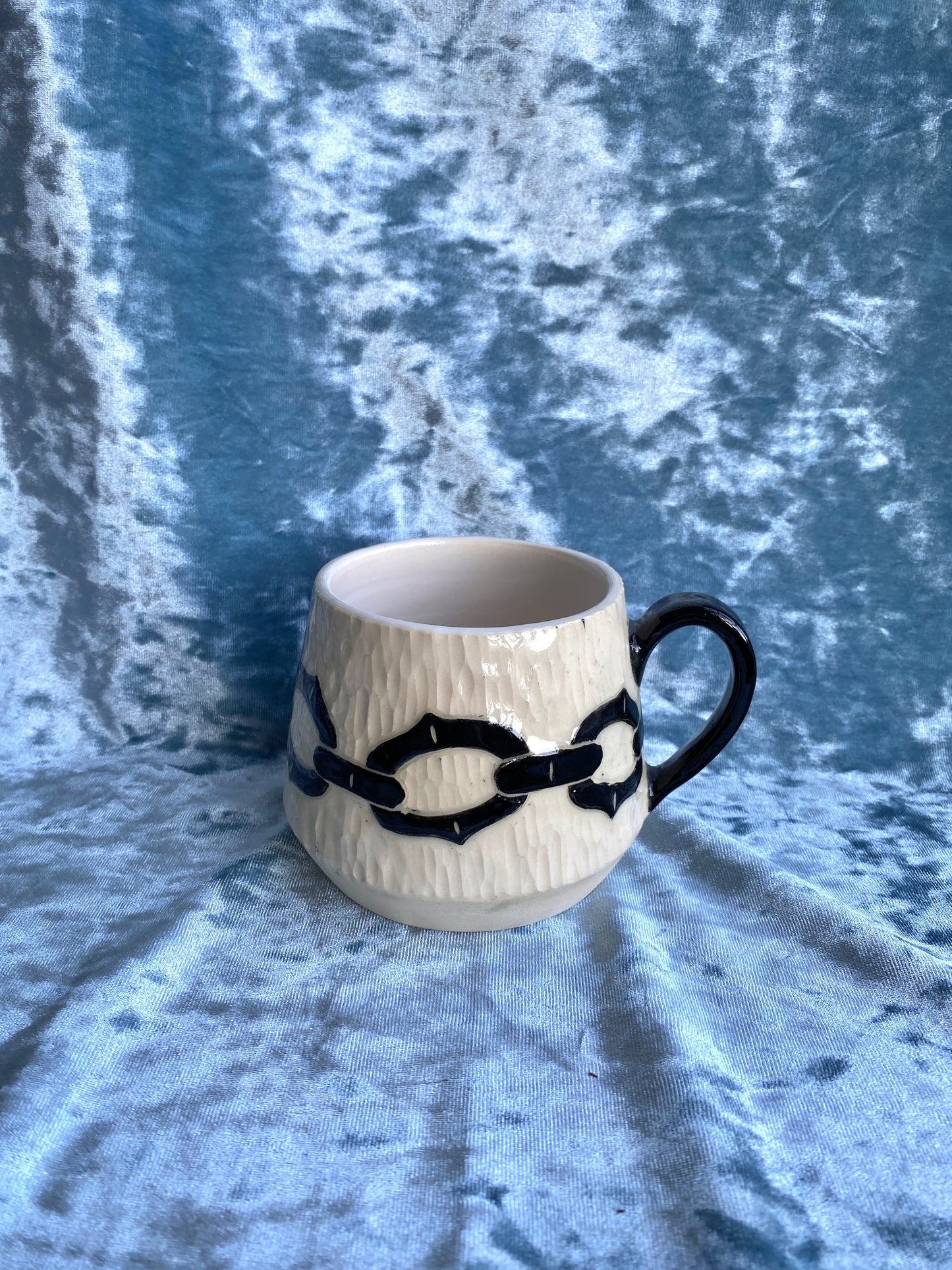 Carved Chain Mug